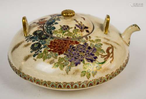 Satsuma wine pot. Japan. Meiji period (1868-1912). Polychrome floral decoration with gilt. Signed. 6