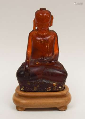 Amber Buddha. Thai. 19th century. 3-1/4