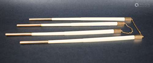 Two pairs of Chop Sticks. 14 Kt gold mounts. 10-1/4