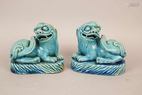 Pair of porcelain Foo Dogs. China. 19th century. Seated figures. Deep turquoise glaze. 4