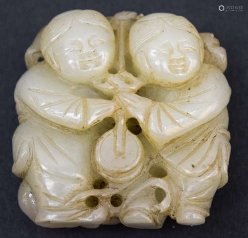 Jade carving. China. 18th century. Grey white stone. Carving of two children 