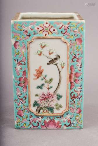 Porcelain brush holder. Tung Chih mark and probably of the period. (1861-1875). Square form. Decoration of raised panels decorated with birds and flowers on a turquoise ground with floral scrolling.