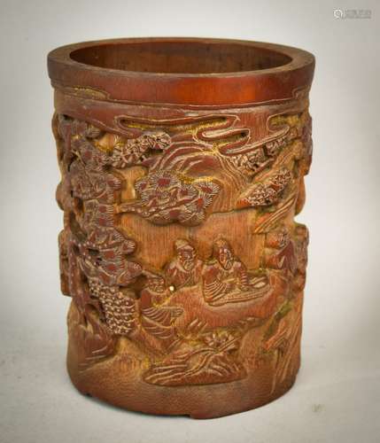 Bamboo brush holder. China. 20th century. Relief carved with scholars and attendants in a pine grove. 6-3/4