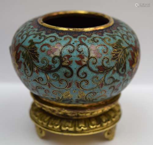 Cloisonné water coupe. China. 20th century. Begging bowl form. Decoration of stylized lotus on a turquoise ground. Gilt base. Ch'ien Lung mark. 3-1/2