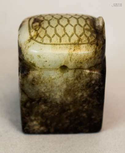 Jade seal. China. Ming period (1368-1644). White stone with black markings. Turtle finial. Seal intact. 1-1/2