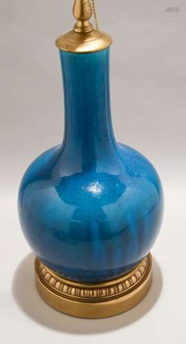 Porcelain vase. China. Late 19th century. Bottle form. Dark turquoise monochrome. Drilled and mounted as a lamp. 11-1/2