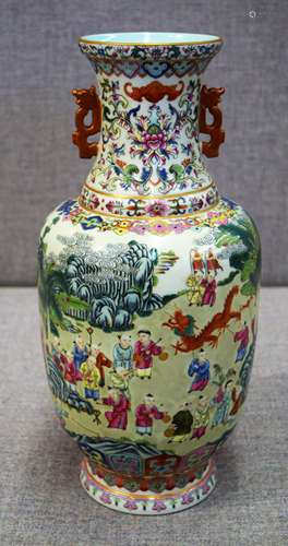 Porcelain vase. China. 20th century. Iron red  dragon handles. Famille rose decoration of 