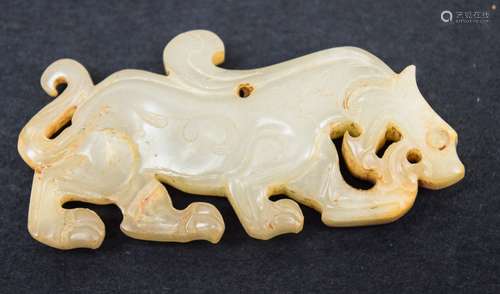 Jade carving . China. 18th/19th century. Calcified white stone. Carving of an archaic style tiger. 2-1/4