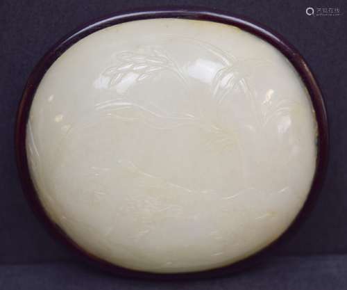 Jade plaque. China. 19th century. Yellow white stone. Carved with quail and millet. Rosewood frame. 4