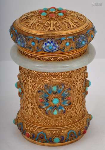 19th/20th century Chinese Gilt Silver and Enameled decorated covered tea cannister with a Celadon Jade bracelet mount. Turquoise and Coral colored cabuchons. Raised enamel floral decoration. Marked 