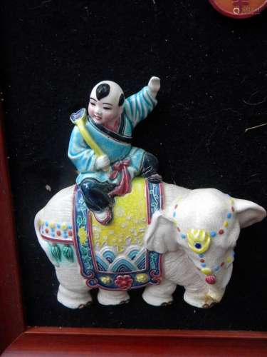 Antique Chinese Boy Riding Elephant Porcelain Statue