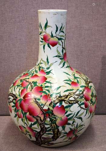 Large porcelain vase. China. 20th century. Bottle form. Famille rose decoration of peaches. Ch'ien Lung mark on the base. 26