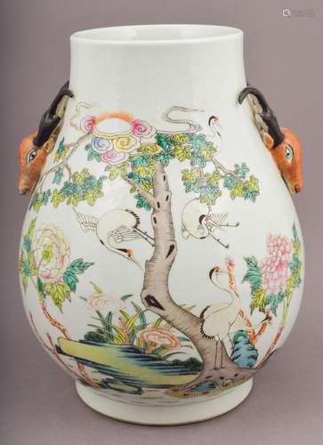 Porcelain vase. China. 20th century. Deer head handles. Famille Rose.