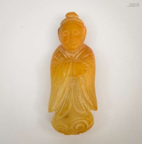 Jade carving. China. 19th century or earlier. Stone of an apricot and white colour. Figure of a standing official. 2