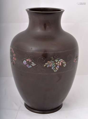 Bronze vase. Japan. Early 20th century. Surface inlaid with silver wires and mother of pearl in a floral pattern. 12