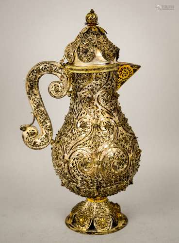 Silver coffee pot. Ottoman. 19th century, possibly earlier. Repousse body with mountings of ornate silver filigree. Areas of parcel gilt. 9-1/2