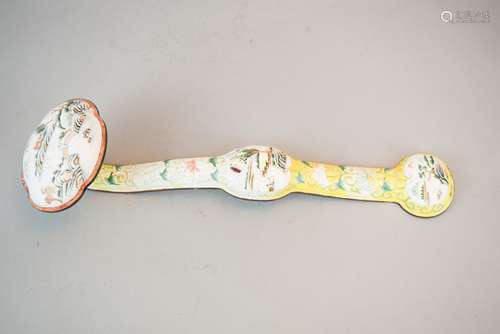 Enameled Scepter. China. Late 19th century. Surface decorated with landscape reserves and lotus scrolling on a yellow ground. 13