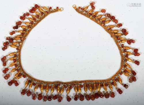 Necklace. Sassanian period. Circa 7th century A.D. Gold bud shaped pendants with carnelian beads.