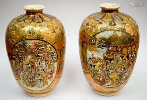 Pair of pottery vases. Japan. Meiji period (1868-1912). Satsuma ware. Decoration of Rakans and figures in reserves on a brocade ground. 3-1/2