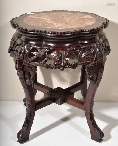 Rosewood Tabouret. China. Late 19th/early 20th century. Floral carved aprons, animal feet. Red marble inset top. 19