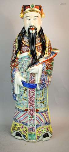 Porcelain figure of the God of Wealth. China. Early 20th century. Surface decorated with Famille Rose enamels. 17