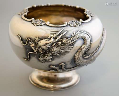 Chinese Export silver bowl. 19th century. Repousse decoration of a dragon and flowers. Signed Zeewo and with two Chinese hallmarks. 5