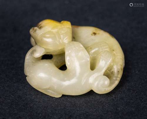 Jade carving. China. 19th century. Study of a cat with a kitten. Grey stone with russet markings. 1-1/2