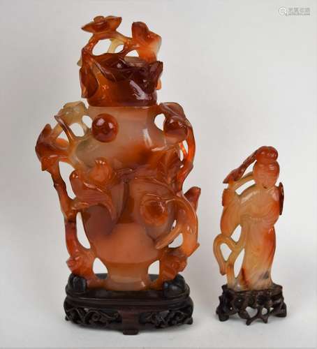 Lot of two Carnelian carvings. China. 19th century. To include a covered jar carved with birds and flowers. 6