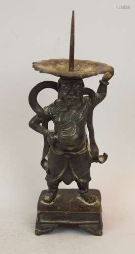 Bronze candle pricket. China. 18th century or earlier. Carytid figure of a Lokapala. 8