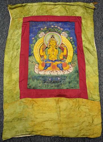 Buddhist Icon. Tibet. Early 20th century. Ink and colours on heavy cloth. Image of Shadakhshari Lokeshvara. 17-3/4