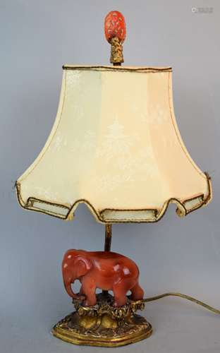 Carnelian carving of an elephant. China. Late 19th- early 20th century. Mounted as a lamp. Carnelian finial. Elephant- 4-1/2