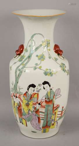 Porcelain vase. China. Early 20th century. Famille Rose decoration of women and children. 16-3/4