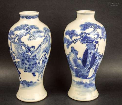 Lot of two porcelain vases. China. 19th century. Underglaze blue decoration. One with the Immortal- Lan Tsai Ho. The other with an historical scene. Each about 8-1/2