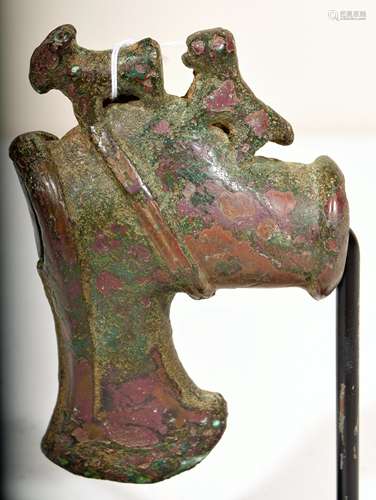 Bronze axe head. Luristan. Circa 1500 BC. Shaft decorated with a bull and a bird. 4