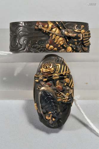 Set Fuchi-Kashira, Japan. 18th/19th century. Copper with inlay of gold, silver and shakudo. Decoration of warriors in armour on horseback crossing the Uje river.