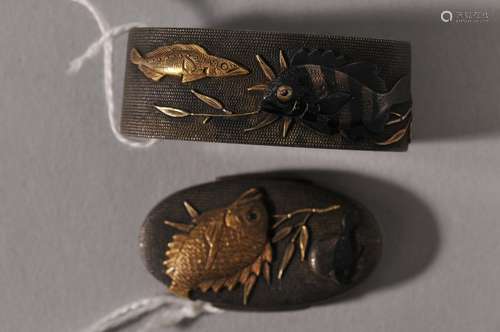 Pair of Fuchi-Kashira. Japan. 18th/19th century. Signed.