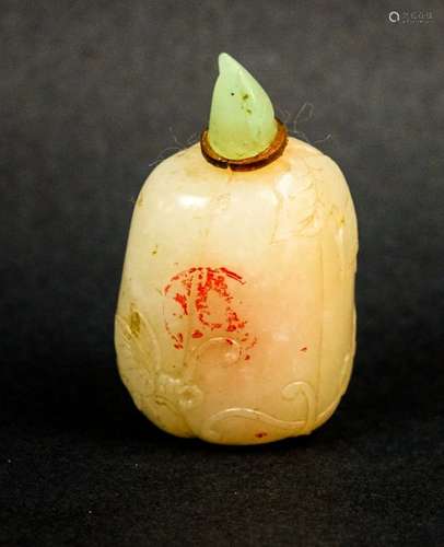 Jade snuff bottle. China. 19th century. Greenish white color.