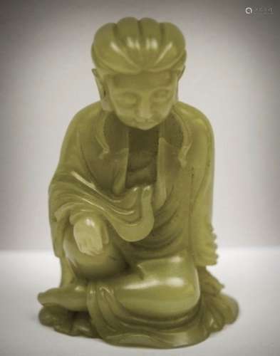 Jade carving. China. 20th century. Yellow-green stone. Seated figures of the Goddess of Mercy Kuan Yin. 2-1/2