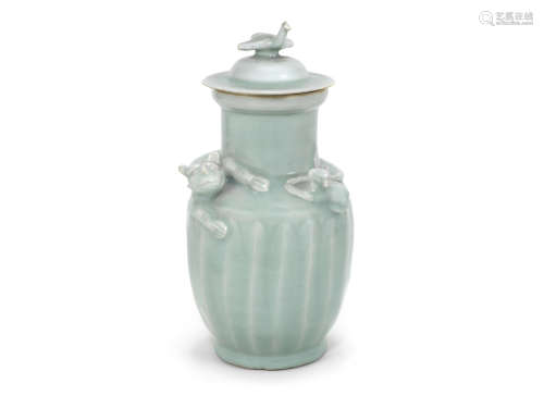 A fine and rare Longquan celadon-glazed 'funerary' jar and cover