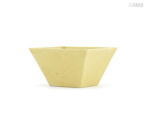 A yellow-glazed square bowl