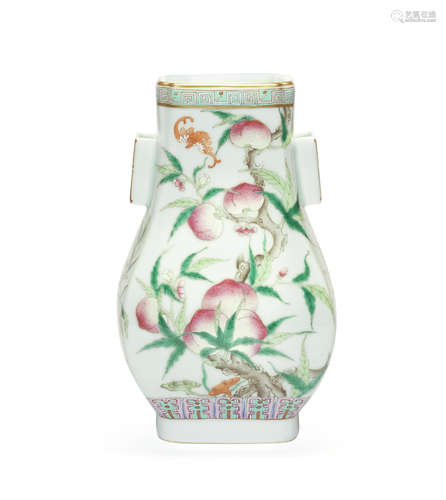 A celadon-ground 'peach and bats' two-handled vase, hu