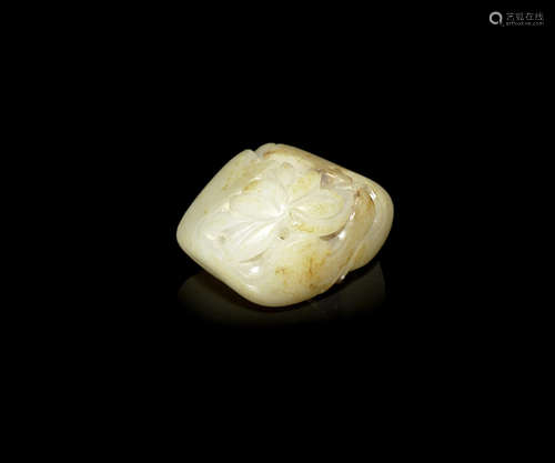 A pale green and russet jade pebble carving