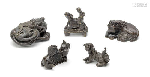 Five bronze scroll weights