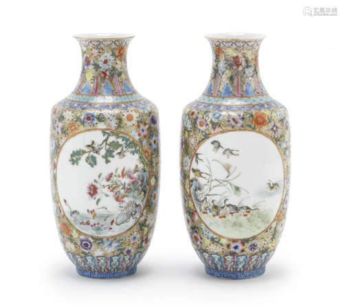 A pair of famille rose 'millefleur' baluster vases