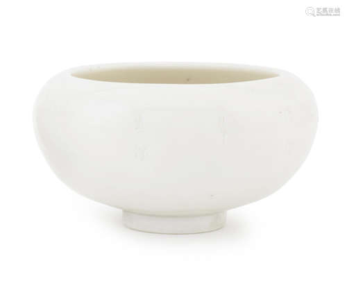 A blanc-de-chine alms bowl