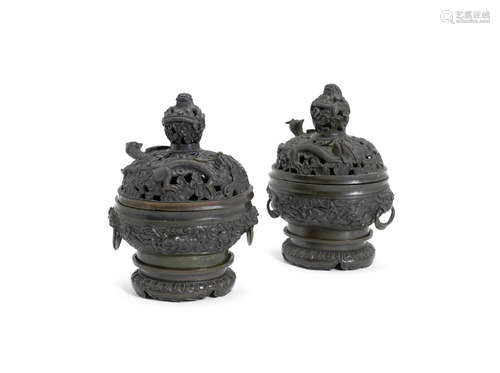 A pair of bronze incense burners, covers and stands