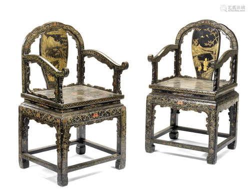 A pair of black and polychrome-lacquered armchairs