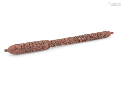 A carved cinnabar lacquer calligrapher's brush