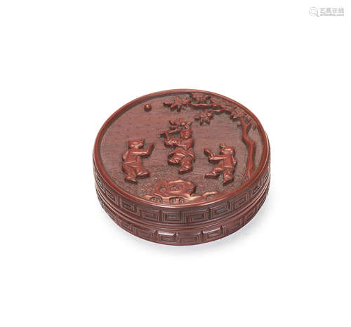 A cinnabar lacquer 'boys' seal paste box and cover