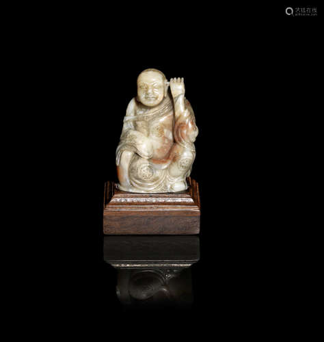 A soapstone figure of Nagasena, the ear-picking arhat